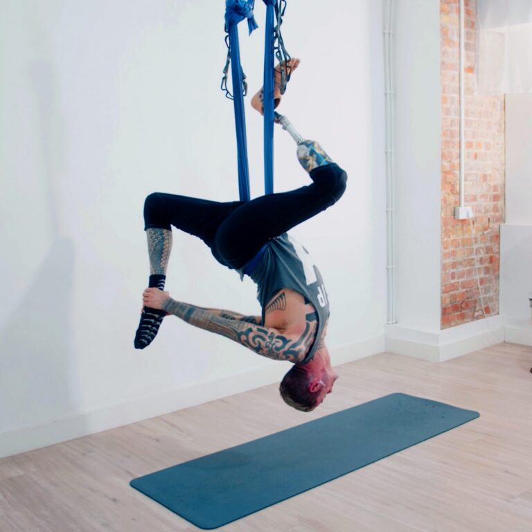 aerial circus class focusing on deep stretch taught by male teacher at london dance academy