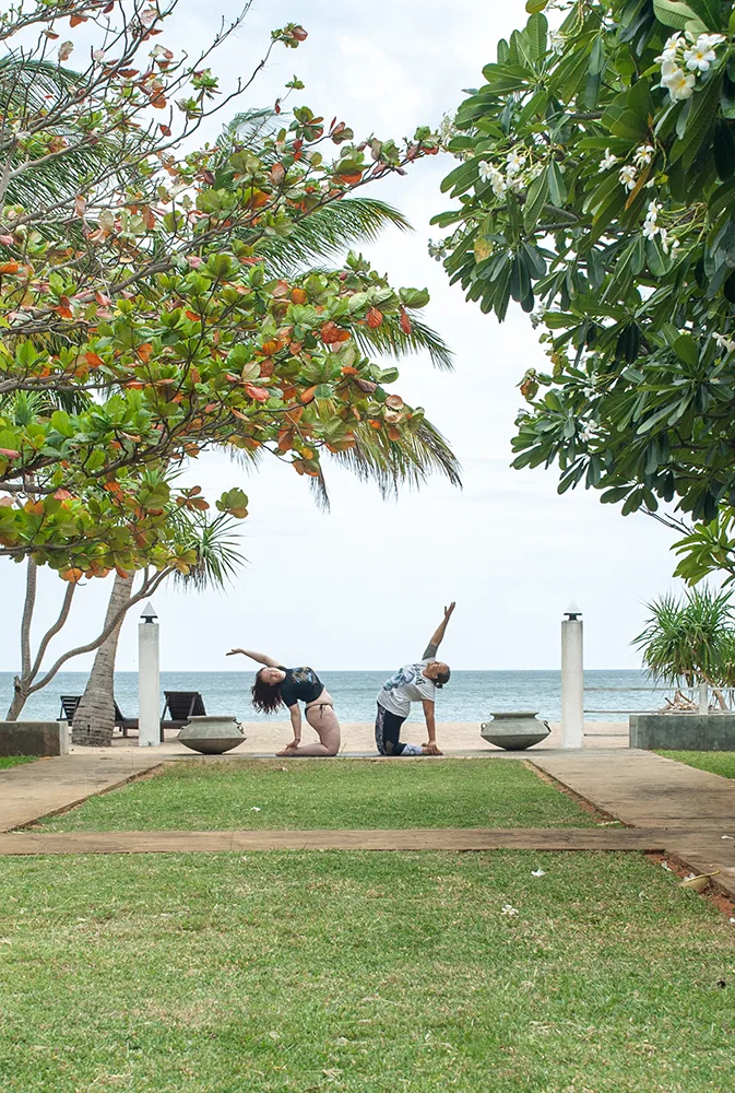 Backbends by the beach